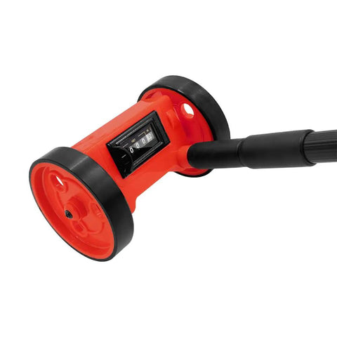 Ace At Garden Layouts With Compact Four Inch Mini Measuring Wheels For Walk Off Distances On Fence Lines showing red measuring wheel with display.