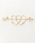 Sleek Wall Mounted Coat Rack Featuring Heavy Duty Gold Metal Hooks To Keep Your Daily Gear Locked Down While Bringing Major Street Style To Any Hallway Entryway Or Office Setup That Never Misses - Decor with hearts and arrow design.