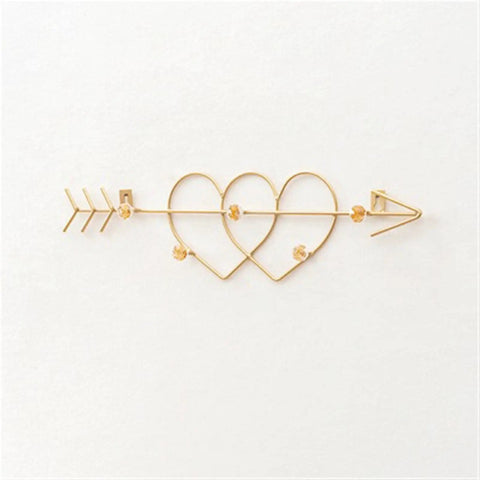 Sleek Wall Mounted Coat Rack Featuring Heavy Duty Gold Metal Hooks To Keep Your Daily Gear Locked Down While Bringing Major Street Style To Any Hallway Entryway Or Office Setup That Never Misses - Decor with hearts and arrow design.