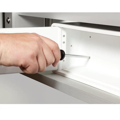 Hand mounting Lockable Safe For Meds With Patented Locking Mechanism Steel Reinforced Body in a drawer, white finish