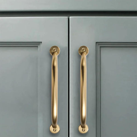 3 Inch Hole Center Brushed Brass Cabinet Pulls 10 Pack Heavy Duty Solid Drawer Handles installed on gray cabinet doors