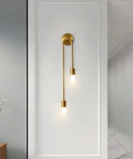 UPRENXIAO Modern Wall Sconce Linear Curved Design Up Down Lighting Ambient(Gold) on a white wall with elegant dual lamps.