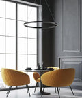 Modern Black Aluminum Pendant Light For Kitchen Island Dining Room With Adjustable Drop Cord above a round table in a stylish setting.