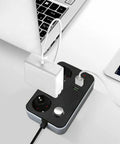 Top Shelf Three Socket Power Strip With Three Usb Ports Surge Protection And Flame Resistant Shell connected to a laptop.