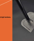 Heavy Duty Carbon Steel Hand Hoe With Ergonomic Rubber Grip For Weeding And Soil Turning Great For Planting And Yard Prep Rust Resistant Powder Coated Finish close-up of carbon steel blade.