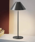 Modern LED Rechargeable Cordless Table Lamp With Dimmable Eye Protection Light on a bedside table