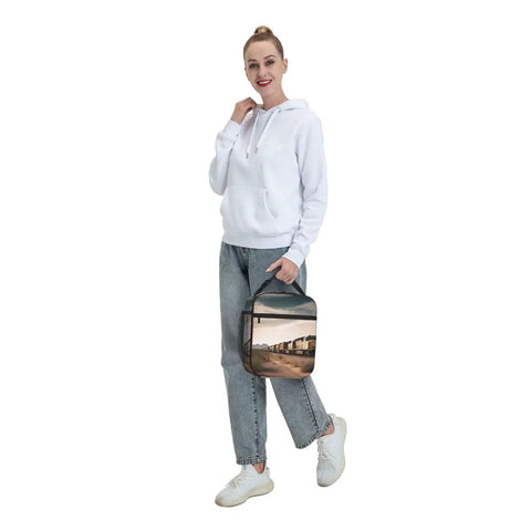 Insulated Lunch Bag With Detachable Handle For Women And Men held by person in white hoodie, durable Oxford cloth