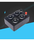 Acxico resistance box, black plastic with four numeric rotary dials (0–9) to 0–9999 Ω, red binding post