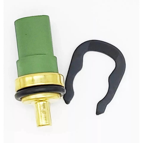 Engine coolant temperature sensor, front view; green plastic body with brass threaded end and black gasket.