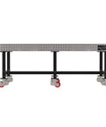 Heavy Duty Mobile Welding Fixture Table With Precision Hole Grid And Smooth Swivel Casters Solid Steel Fabrication Workbench side view with red casters