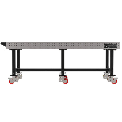 Heavy Duty Mobile Welding Fixture Table With Precision Hole Grid And Smooth Swivel Casters Solid Steel Fabrication Workbench side view with red casters