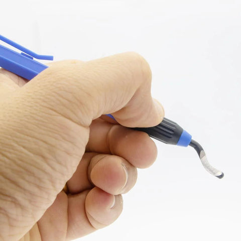 Deburring tool with blue handle and curved swivel blade, close-up view.