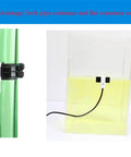No Contact Liquid Level Sensor For Pipes And Tanks installed on a green pipe and clear tank for contactless water detection.