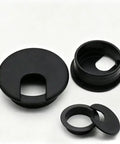 Premium Desktop Grommet Covers Slick Cable Organizers Hella Tough ABS Plastic Wire Routing Kit For Working From Home Office Setup No Mess Cord Management 5 Pack Black Two Point Five Inch Opening Sweet Fit Design close-up of black grommet covers
