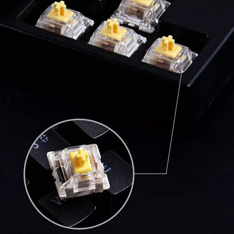 Eighty Seven Key Wired Mechanical Keyboard With RGB Led Backlight And Smooth Tactile Switches showing yellow switches close-up
