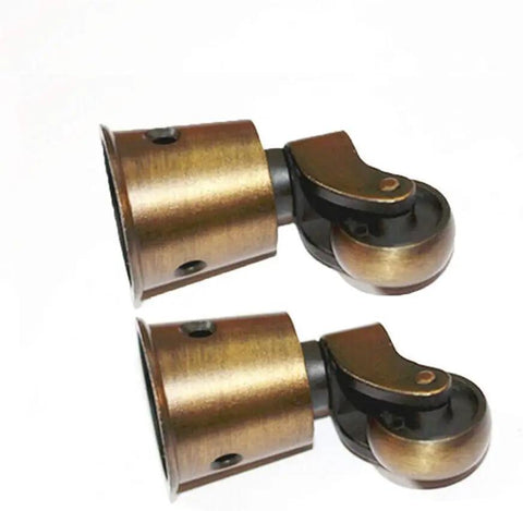 Heavy Duty Solid Brass Furniture Casters Featuring Hella Smooth Silent Swivel Wheels Vintage Round Cup Rollers Glide Hardware For Couches And Tables Light Bronze Finish Three Hole Mount Base Rust Resistant Design close-up view of two casters.