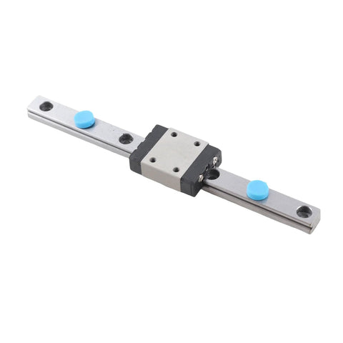Side view: 100mm linear rail guide with sliding block on silver steel rail, blue caps, Amazon