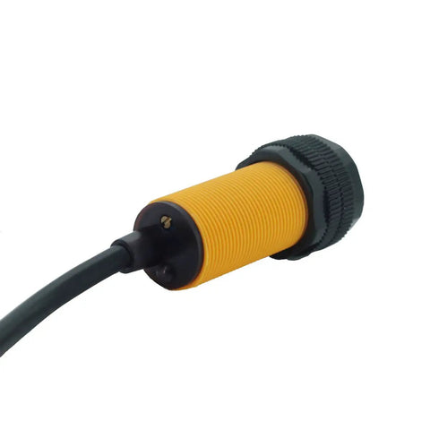 Close-up of Three Pack Dope Infrared Photoelectric Obstacle Avoidance Sensor Module E18 D80NK Proximity Switch with yellow housing