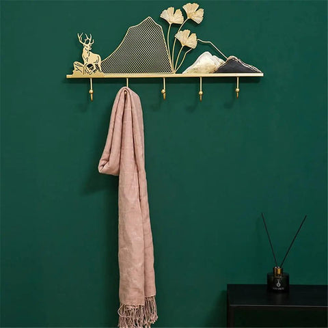 Tough Metal Wall Hook Heavy Duty Coat Rack With Extra Spacious Storage For Keys Umbrellas Coats And Hats mounted with a pink scarf.