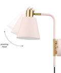 Cleo 1 Light Wall Sconce with plug-in or hardwire setup, blush pink finish with matte brass accents, pivoting head shown