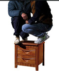 Killer Sturdy Industrial End Table With Stackable Design And Front Storage Compartment Rustic Brown Wood Look showing two people squatting on it.