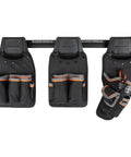 Three Tradesman Pro Modular Drill Pouch with Belt Clip for Click Lock System on a modular wall rack.