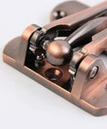 Close-up view of WUUWCHODC Sliding Door Bolt Lock for Gate Wooden Security Latch featuring steel ball positioning mechanism.