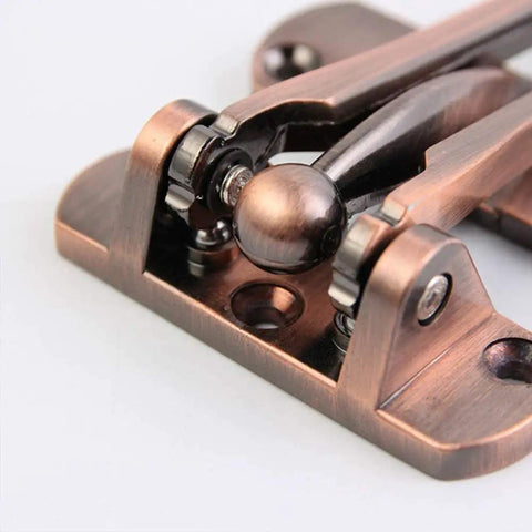 Close-up of WUUWCHODC Heavy Duty Door Slide Bolt Lock Gate Latch Sliding Security, bronze metal with ball positioning and sturdy design.