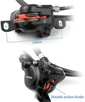 Shimano hydraulic disc brake set for bicycle, front and rear, black calipers with red pads visible.