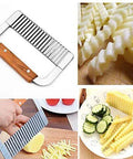 Crinkle-cut slicer with stainless steel blade and wooden handle; for cutting potatoes, vegetables, and fruit.