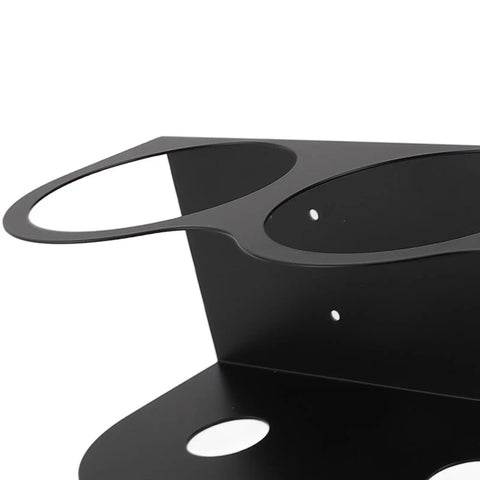 Close-up of Heavy Duty Workhorse Wall Mounted Spray Can Holder Rack, solid iron organizer with two circular openings.