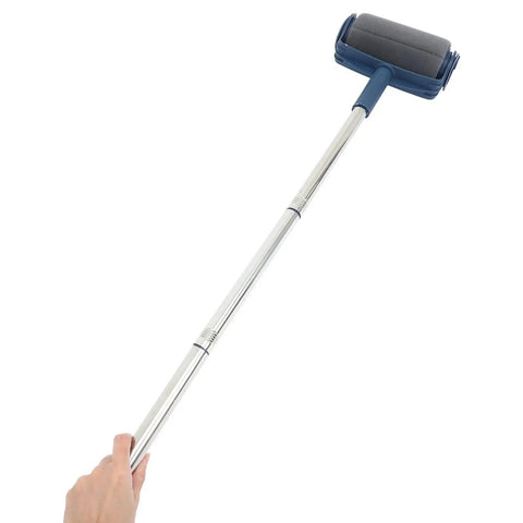 Pro Grade Paint Roller Kit With Adjustable Telescopic Handle For Effortless Ceiling And Wall Coating That Makes DIY Renovation A Real Breeze Without Drips Or Streaks, Hand holding a blue paint roller with silver telescopic handle.