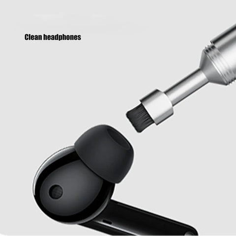 All In One Handy Multitool For Home And Outdoors With Package Opener Brush And Phone Ejector Rugged Metal Build shown cleaning earbud