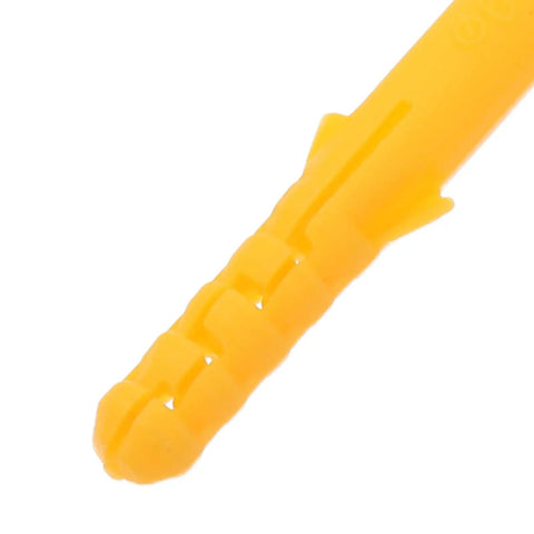 Close-up of yellow ribbed plastic piece from 200 Pack Yellow Self Drilling Ribbed Wall Plugs Set for Drywall and Hollow Walls.