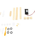 Parts laid out for Electric Wood Glider Aircraft Model Kit For Kids 7 And Up with wood, plastic, and metal components.