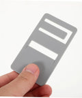 Gray durable clips from the Rv Refrigerator Handle Repair Kit 2 Pack Durable Door Prop Clips For Seamless Fixes Quick And Easy Installation Repair Damaged Handles And Rv Door Parts DIY Friendly And Budget Saver held in hand.