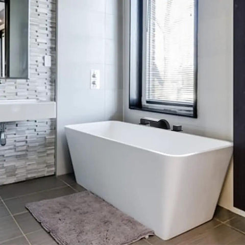 Modern bathroom with Matte Black Waterfall Tub Faucet With Widespread Spout, Deck Mount Roman Tub Filler near a white tub.