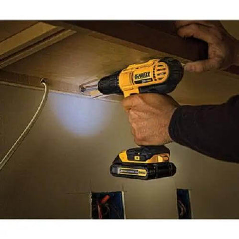Boss Level 20V Cordless Drill Driver Kit With Compact Circular Saw High Performance Motor Two Speed Transmission Tough Build For Tight Spots Smooth Operation Job Ready Heavy Duty Lithium Power No Sweat Pros Trust This Legit Top Shelf Combo in action with focused light.