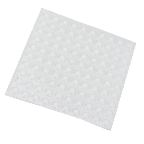 Sheet of self adhesive no slip transparent rubber buffer pads for tables, chairs, photo frames and furniture, clear cushioning feet pads.