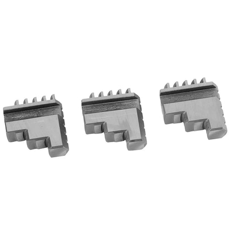 Three metal jaws from the Bulletproof Three Piece Inside And Outside Jaw Chuck Set for lathe machining precision.