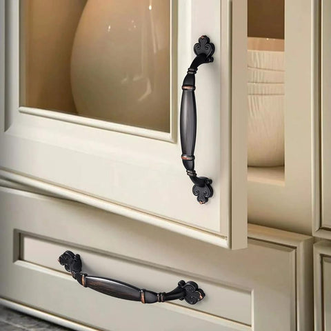 Oil Rubbed Bronze Vintage Cabinet Hardware Pulls 5 Inch 128mm Screw Spacing Set installed on kitchen cupboard doors.