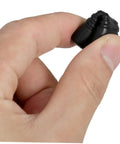Close-up of hand holding black rubber piece from Two Pack Espresso Steam Wand Rubber Sleeve Covers For Heat Safety On Coffee Machines