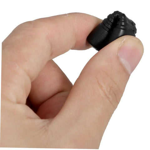 Close-up of hand holding black rubber piece from Two Pack Espresso Steam Wand Rubber Sleeve Covers For Heat Safety On Coffee Machines