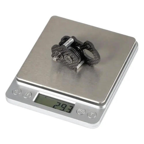 Ultra Light Portal Transmission With 48P Gears And Sleek Carbon Fiber Tiny Gearbox on scale showing 29.3g weight.