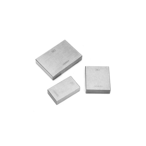 122 Piece Hardened Steel Precision Gauge Block Set With Zero Point Zero Zero Zero One Millimeter Calibration showing three gauge blocks.
