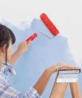 Person using the Game Changing Wall Embossing Roller For DIY Pros to paint textured finishes on a wall.
