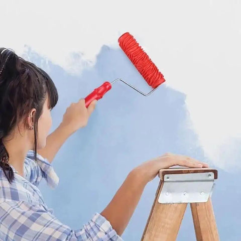 Person using the Game Changing Wall Embossing Roller For DIY Pros to paint textured finishes on a wall.