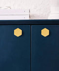 Solid Brass Cabinet Knob And Drawer Pull Set 1 1/10 Inch Brushed Gold Hexagon Handles on blue cabinet doors