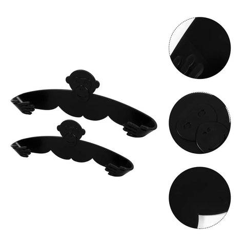 Black traceless wall mounted pot lid rack organizer, durable PP plastic, no drill installation, shown with strong load-bearing capacity.
