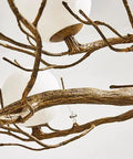 Close-up view of Branch Design Ceiling Pendant Light Vintage Moon Art Chandelier 9 Light Array with gold branches and white globes.